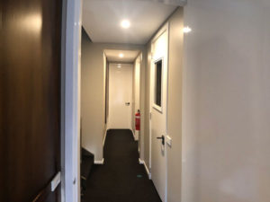 Corridor and fire extinguisher